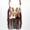 ADBG393 White & Black Cowhide Crossbody Bag with Tooled Leather Saddle Flap Accents and Fringe