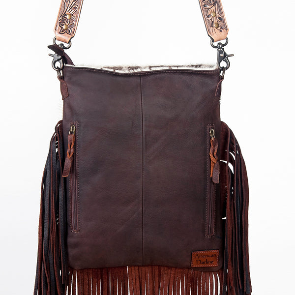 ADBG393 White & Black Cowhide Crossbody Bag with Tooled Leather Saddle Flap Accents and Fringe