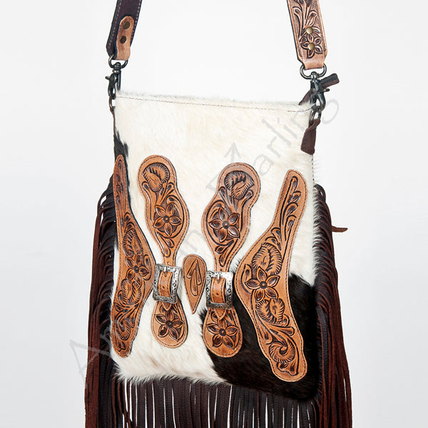ADBG393 White & Black Cowhide Crossbody Bag with Tooled Leather Saddle Flap Accents and Fringe