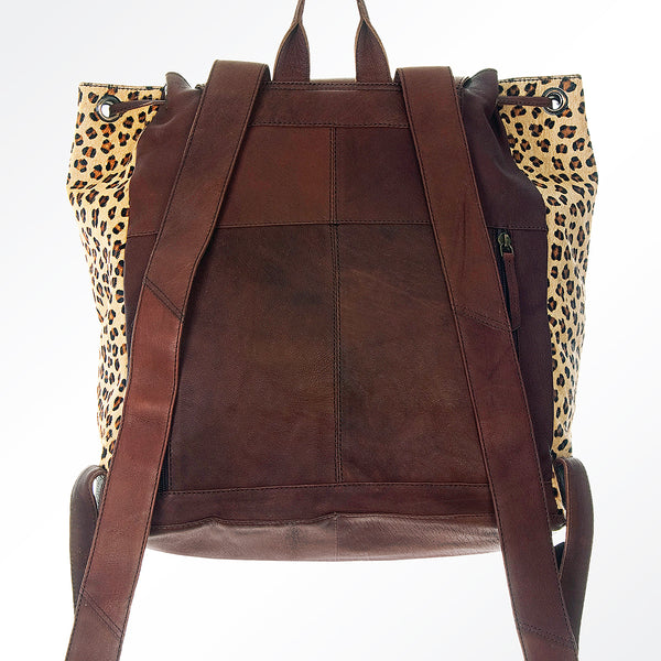 ADBGI110 Tooled Leather Western Backpack - Hair-On Hide with Floral Carving