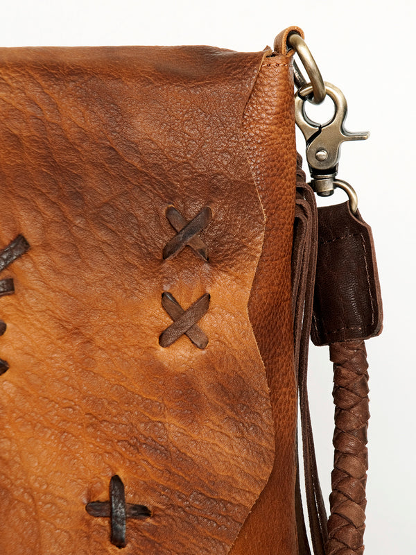ADBGM282 Raw-Edge Tribal Leather Crossbody - Fringe, Bone Accent & Braided Strap