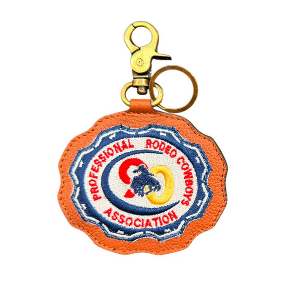 Official PRCA & NFR Licensed Collection® Embroidered Emblem Cognac Leather Keychain Charm