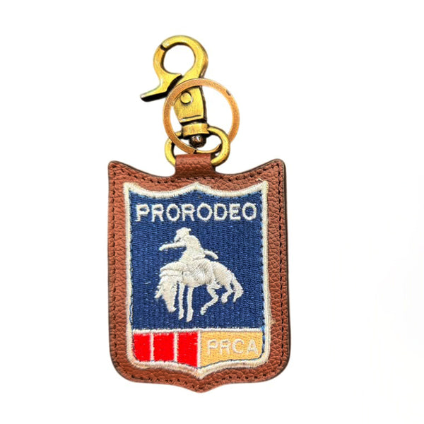 Official PRCA & NFR Licensed Collection Bucking Horse Shield Leather Swivel Keychain Charm